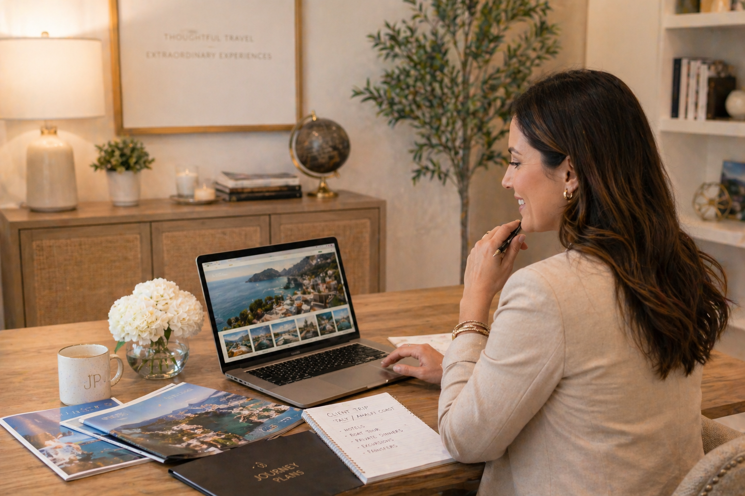 Woman looking at locations on a laptop in an office