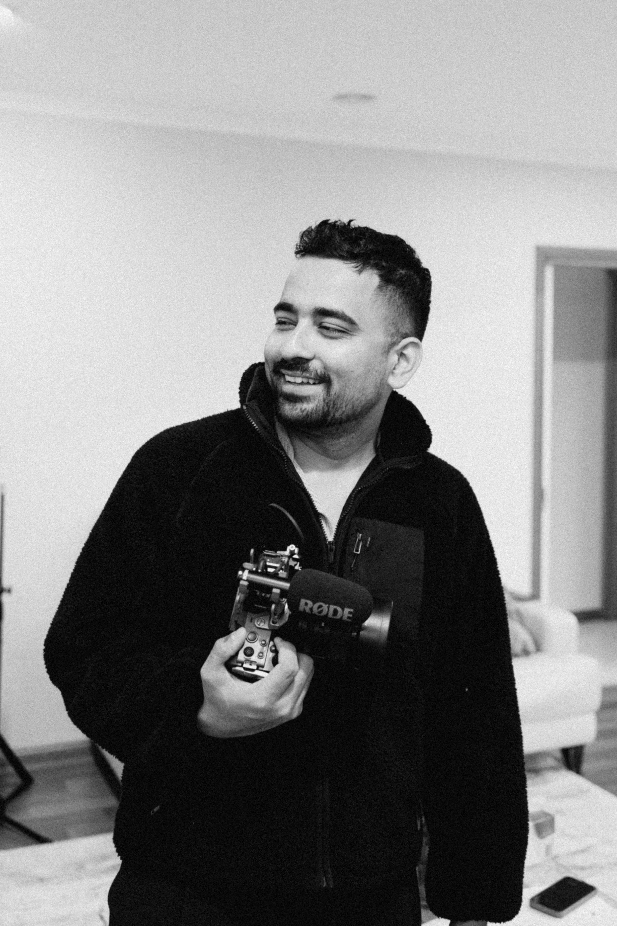 Melbourne filmmaker and photographer Shekhar Rawat with his camera and RØDE microphone