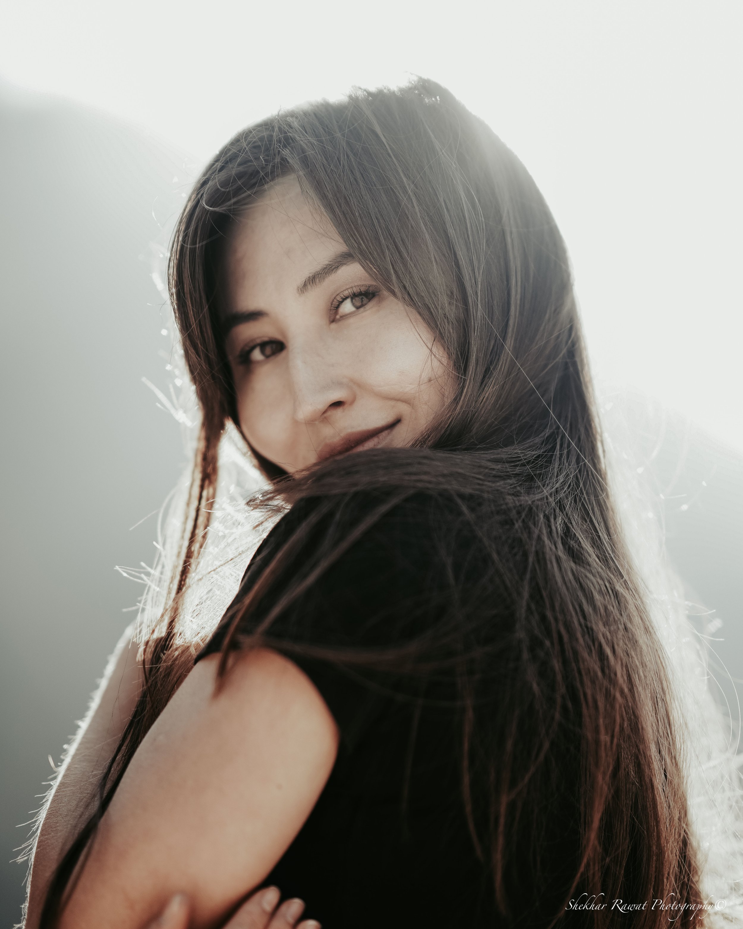 Smiling close-up portrait in soft golden backlight, headshot and portrait photography by Melbourne photographer Shekhar Rawat