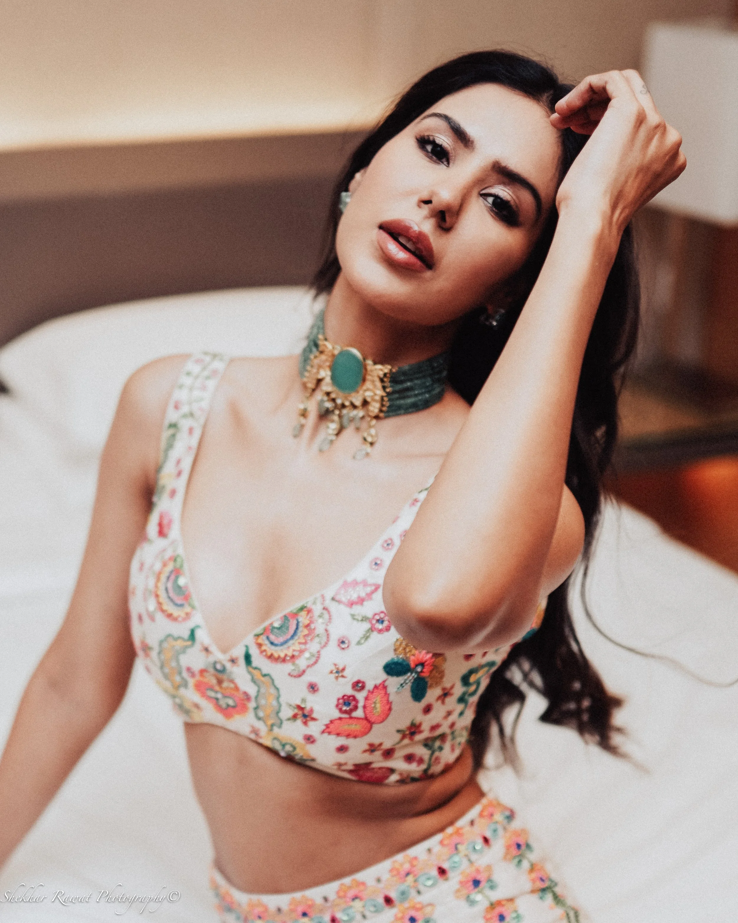 Actress Sonam Bajwa in an embroidered top and turquoise necklace, photographed by Shekhar Rawat