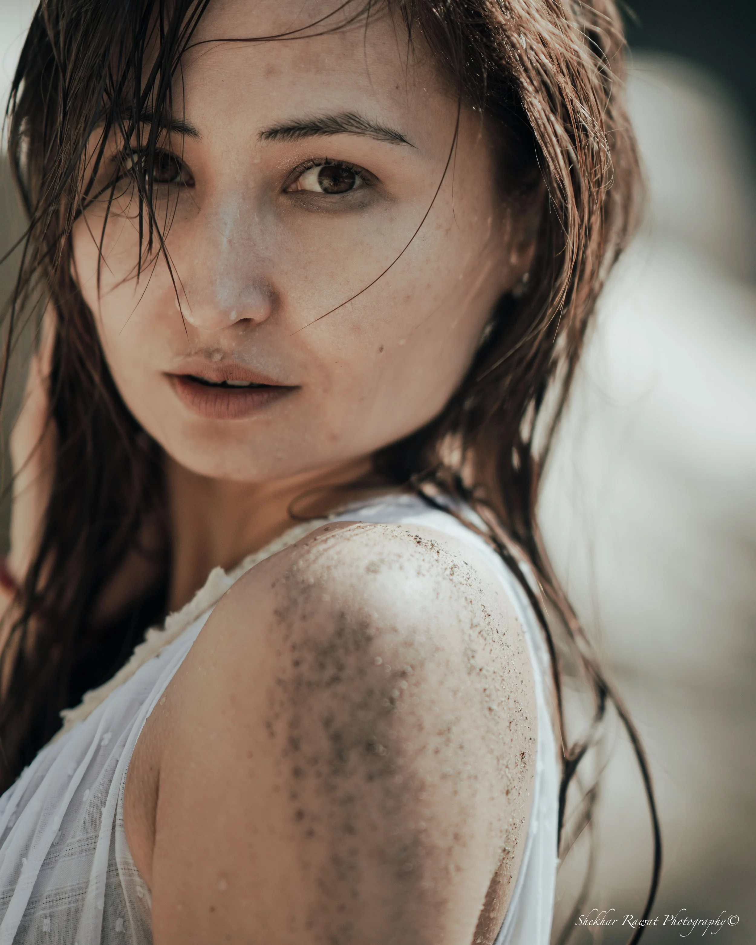 Natural close-up portrait with freckles and a white top, portrait photography by Melbourne photographer Shekhar Rawat