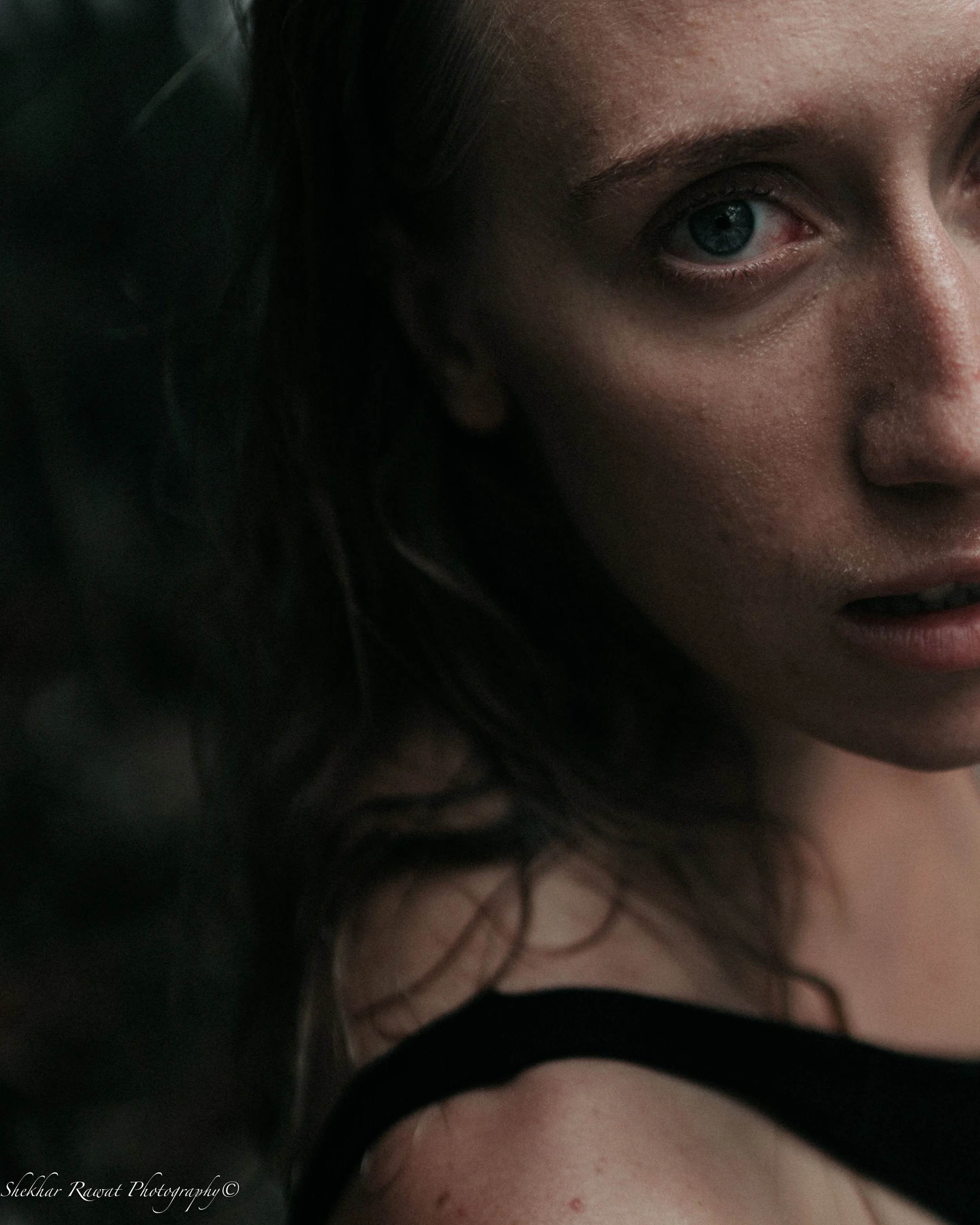 Dramatic low-light close-up of an eye, cinematic portrait by Melbourne photographer Shekhar Rawat
