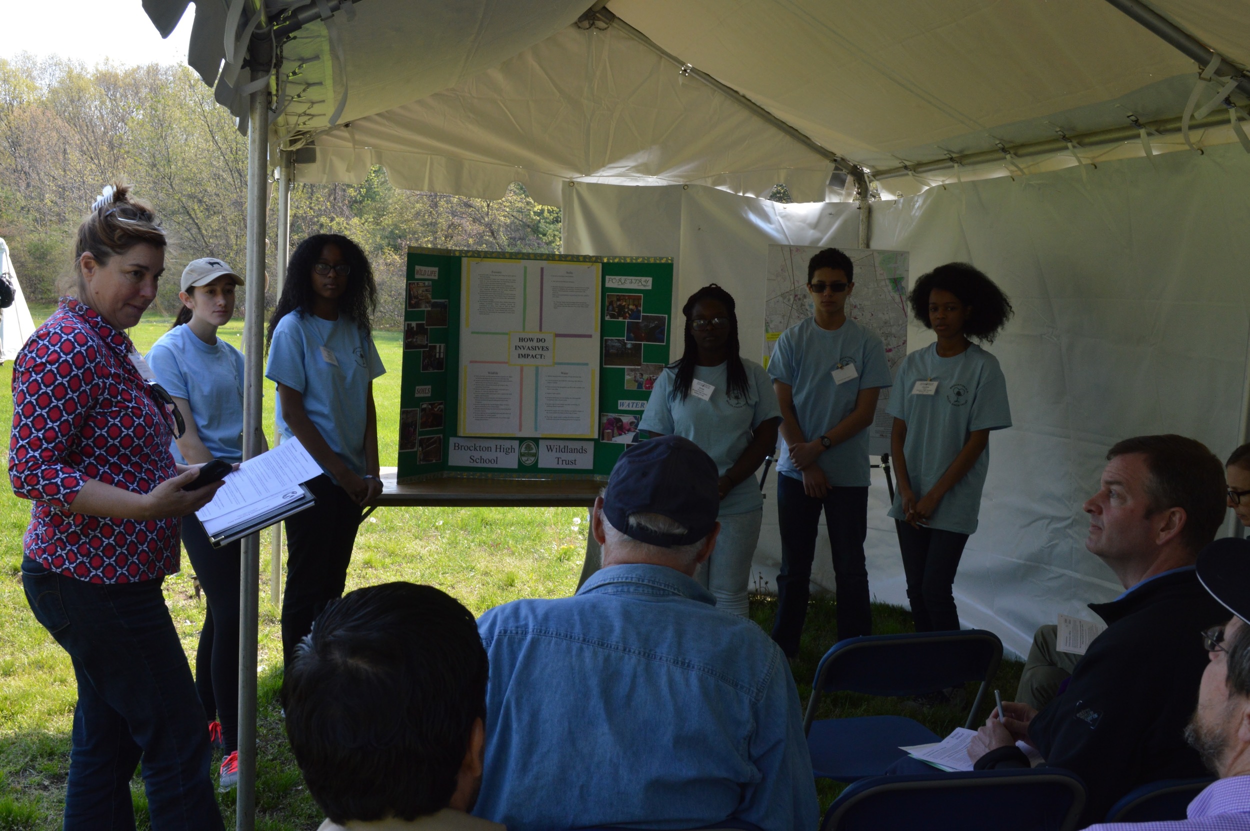 Students present their findings about Invasive Species