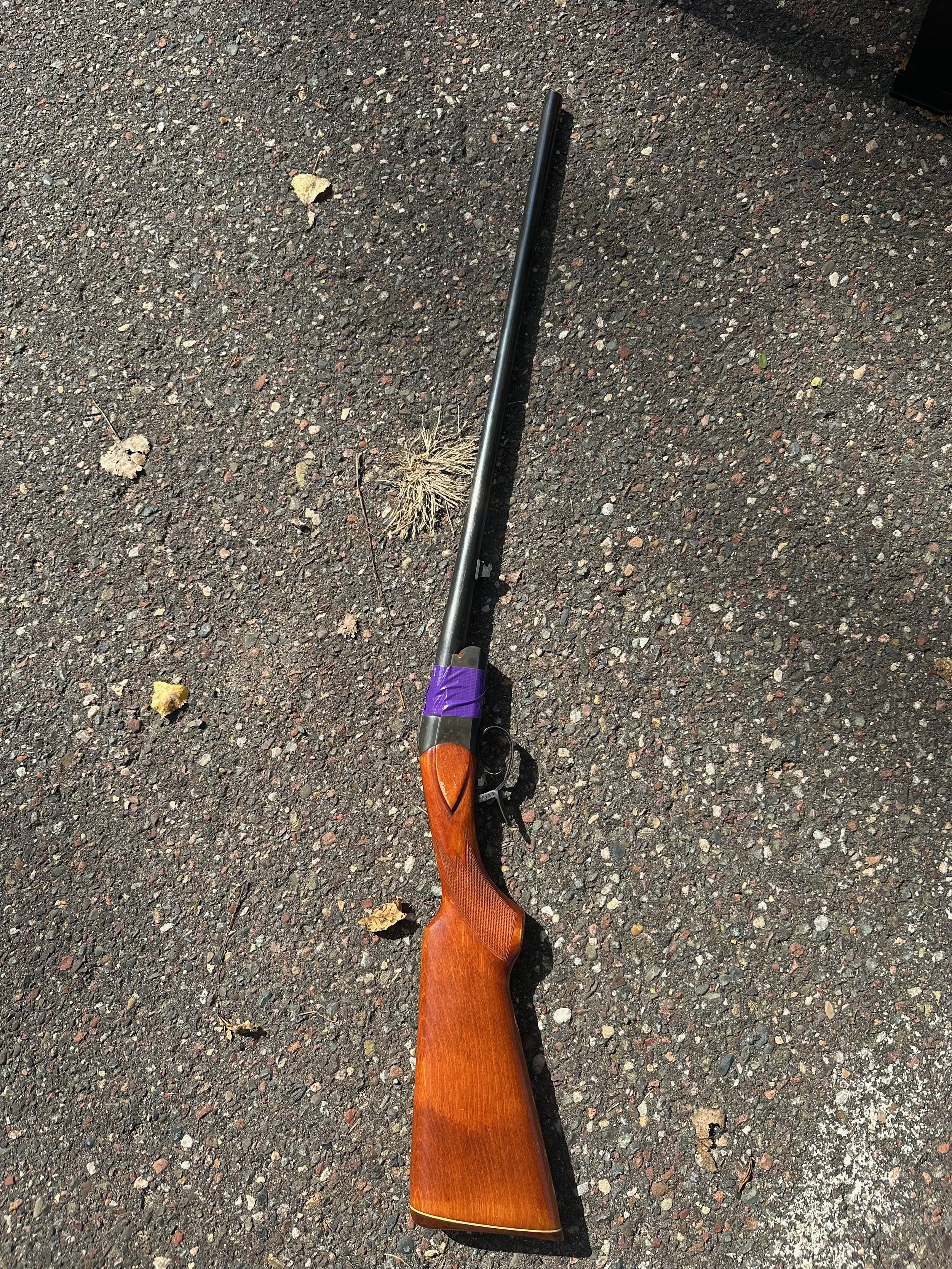 Before: surrendered rifle 