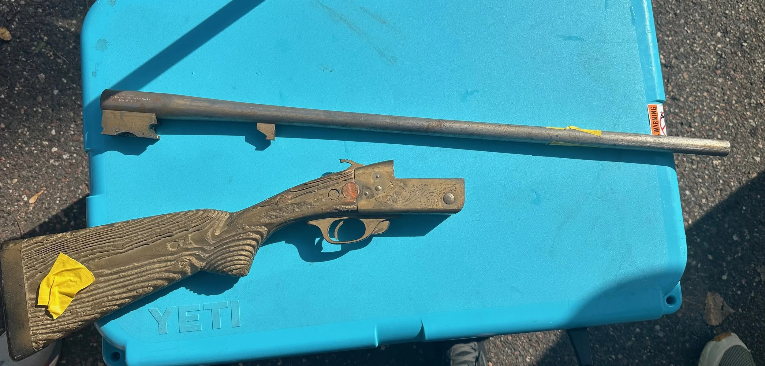 Before: surrendered rifle 