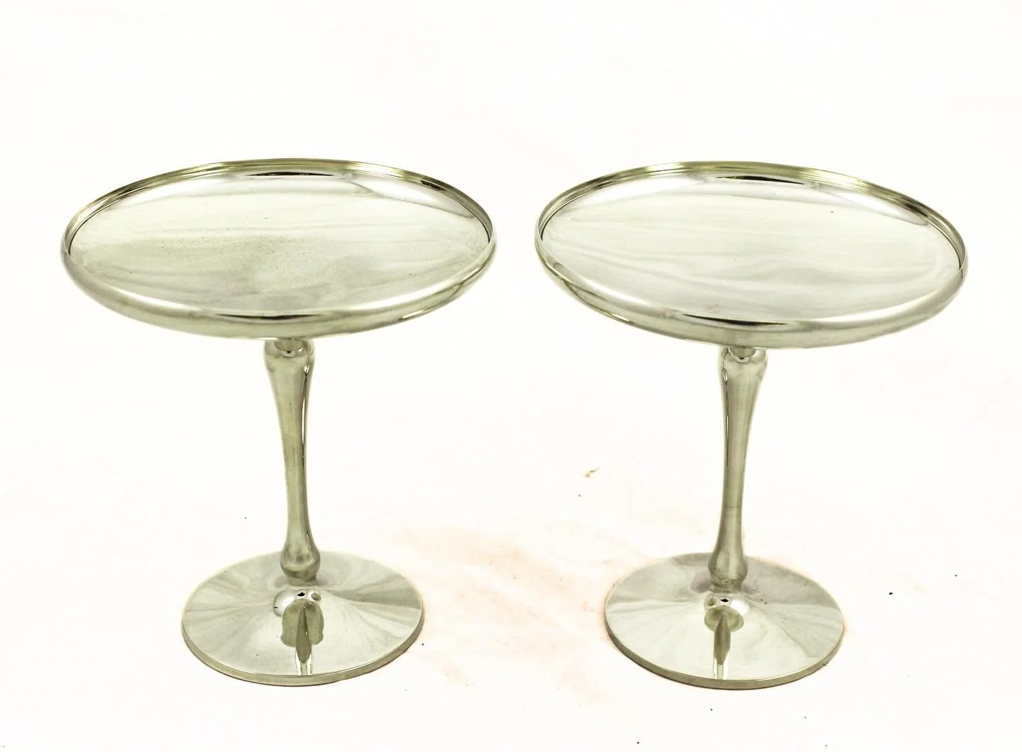 Yesterday: late 19th century repouss&eacute;&mdash;floral, scrolling, gloriously ornate.
Today: pure Midcentury Modern restraint.
These sterling silver compotes by Shreve &amp; Company are the definition of sleek. Clean lines, a perfectly balanced pe