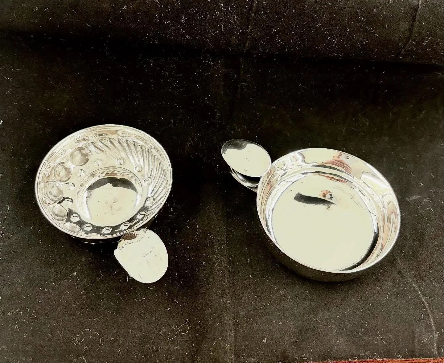 Two small sterling silver pieces&hellip;
Both beautifully made.
Both with unusual handles.
Both designed with a very specific purpose in mind.

But what exactly were they used for?

Take a close look:
&bull; One has a smooth, simple interior.
&bull; 