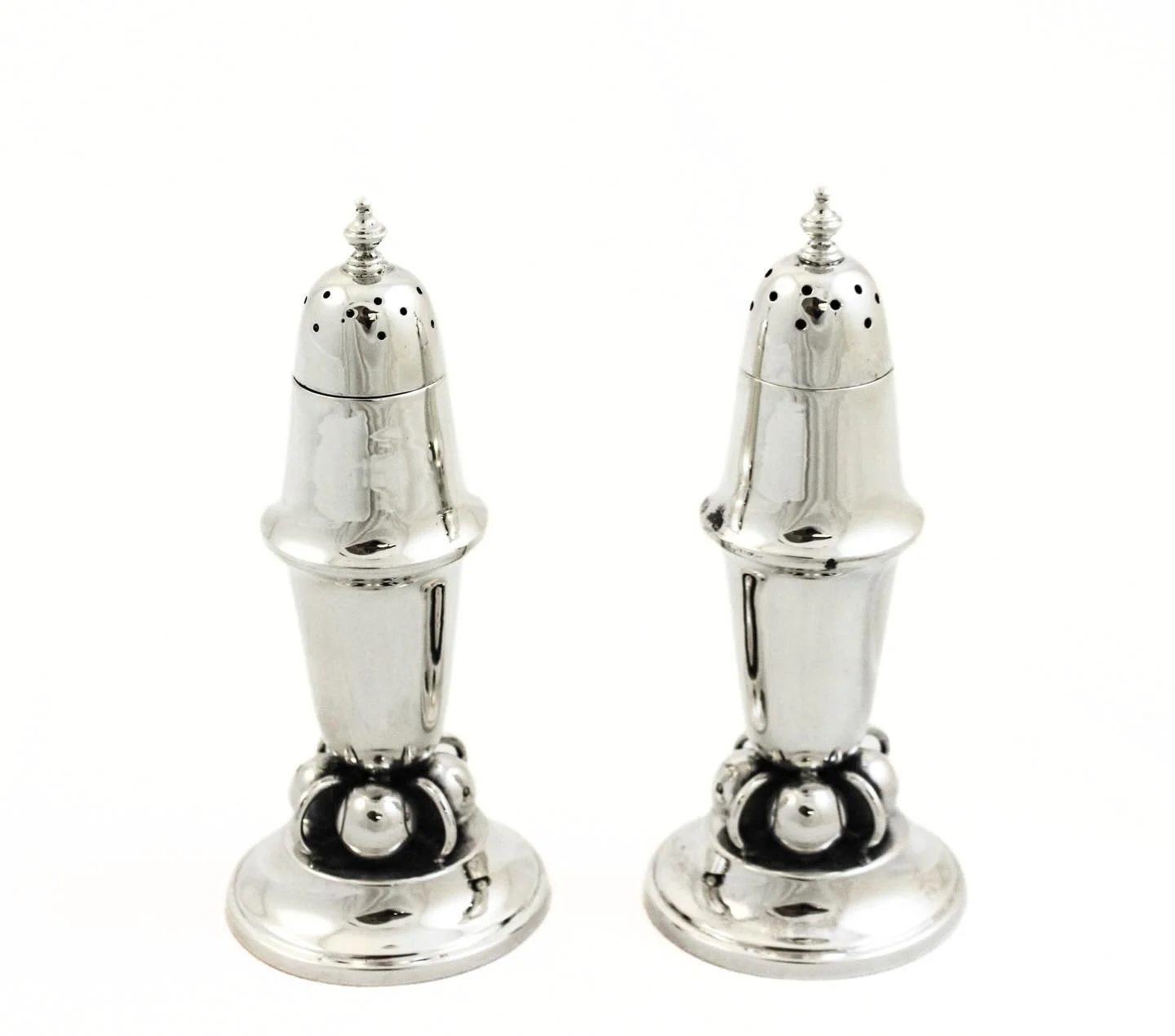 There&rsquo;s something about a proper pair of sterling shakers&mdash;timeless, balanced, and quietly elegant without trying too hard.

These classic sterling silver salt shakers feature a beautifully proportioned form, crowned with traditional pierc