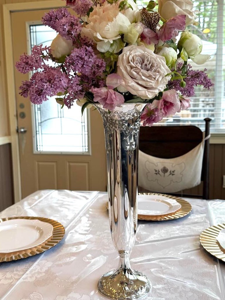 There is something deeply meaningful about seeing sterling silver leave the shop and become part of a family&rsquo;s new beginning.
One customer selected a magnificent 16&rdquo; trumpet vase by Reed &amp; Barton, circa 1937, transformed into an elega