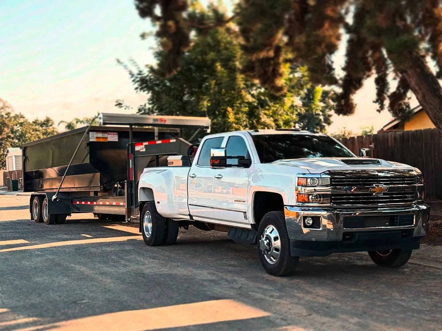 Couldn’t resist! Dropping a bin during golden hour is 🔥!! #duramax #rolloff #vpr