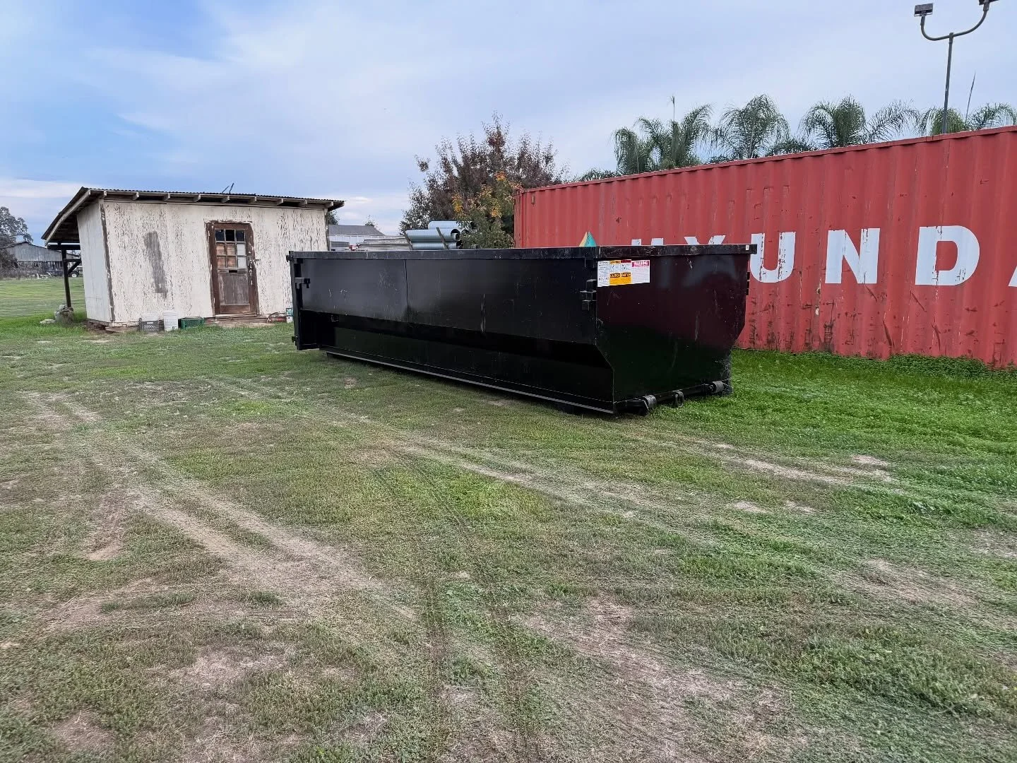 Getting the rest of our bins out before this rainstorm hits! Message us today for your roll off needs!