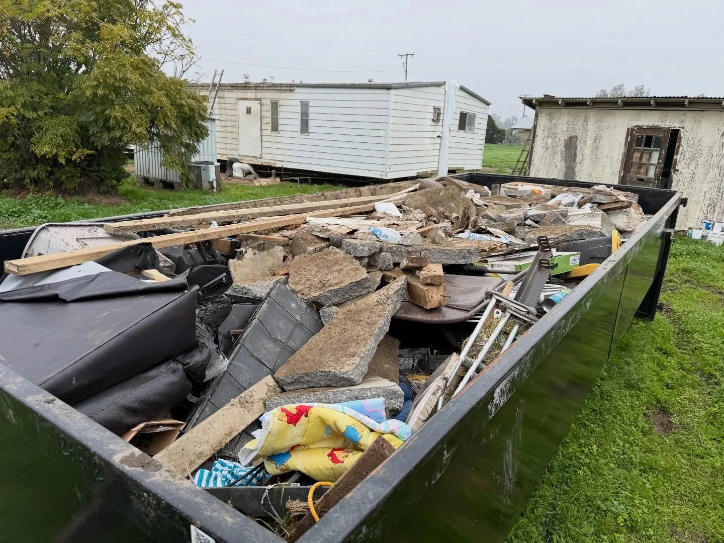 Full load for this 25 yard dumpster! Message us today to get your dumpster!