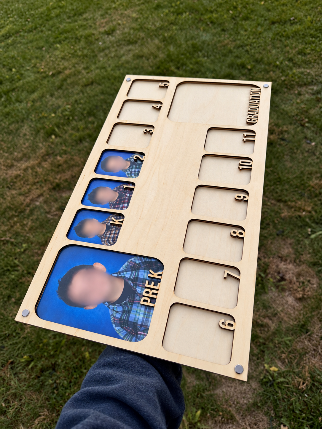 Blurred-Face Wooden School Years Board.png