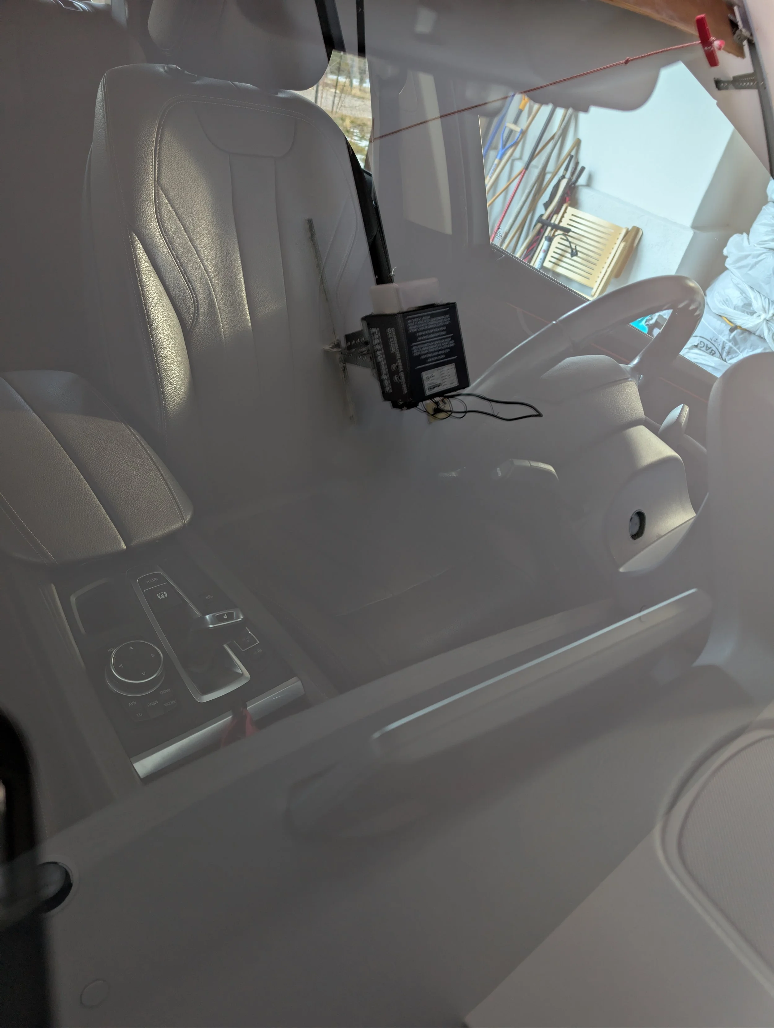 A windshield after the large rock chip was repaired.