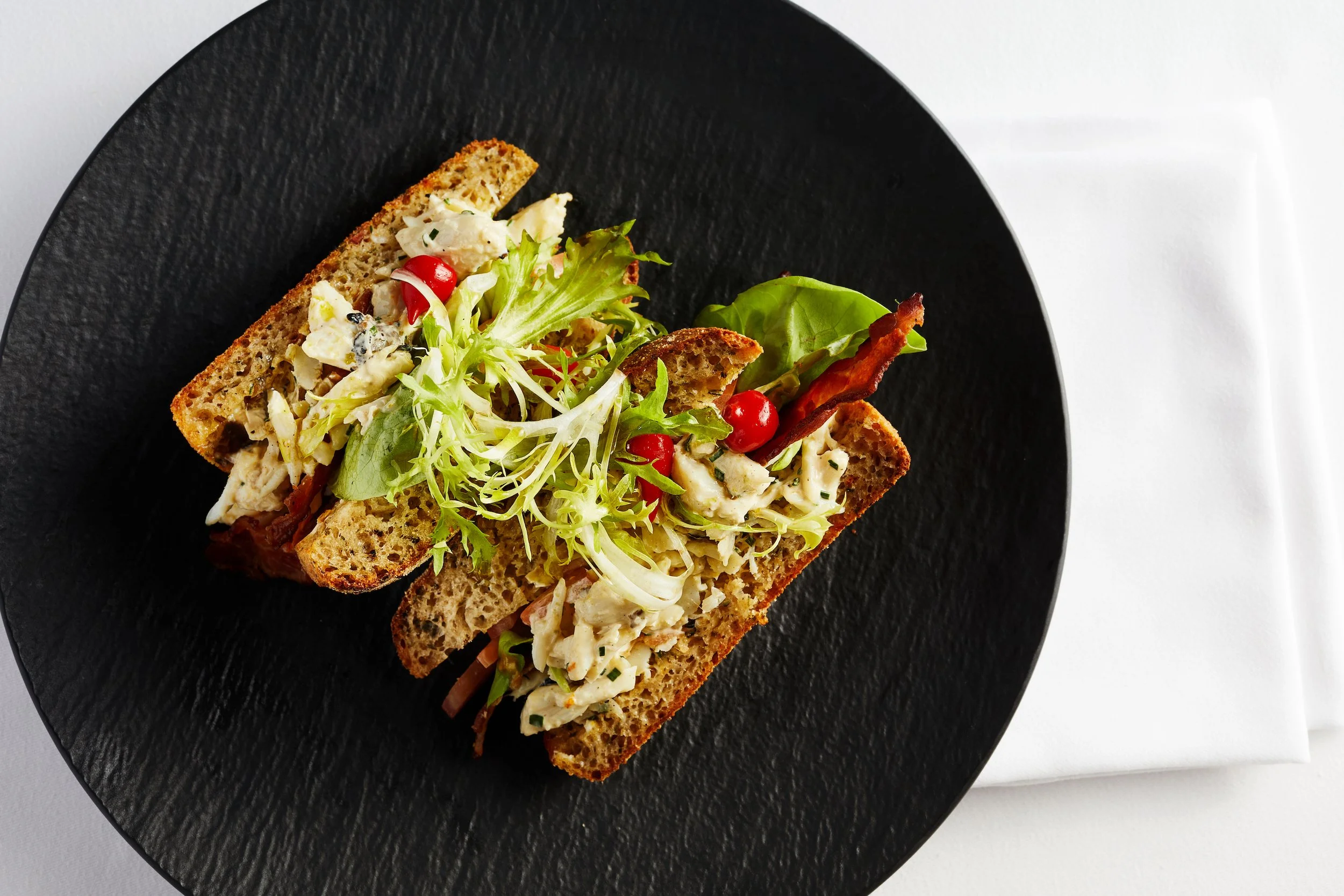 Enjoy the delicious cuisine of New Orleans by grabbing lunch at The Grill Room