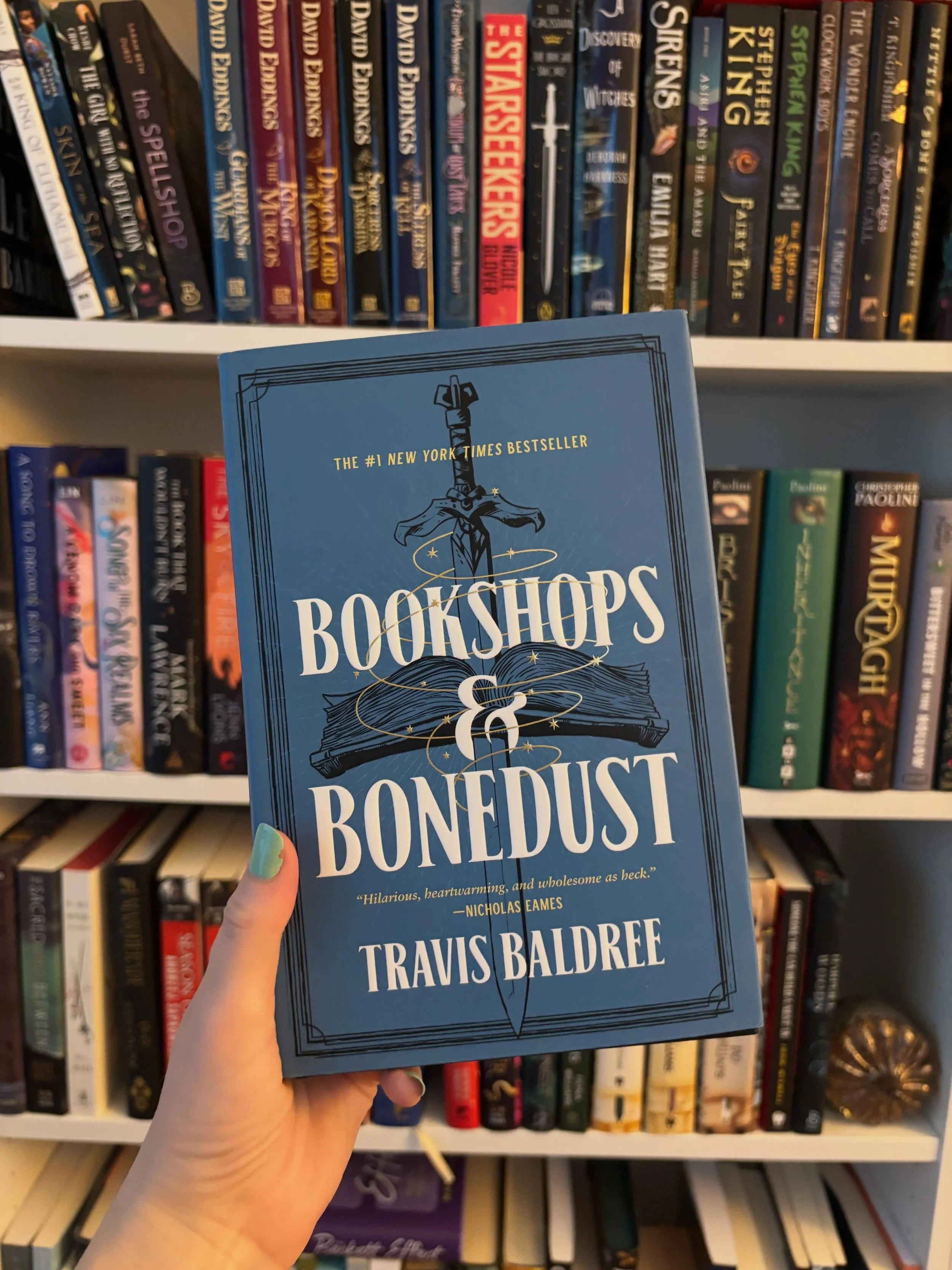 You&rsquo;d think as someone who writes cozy fantasy that I would have read Travis Baldree by now. I completely see what I was missing out on. Bookshops and Bonedust was such a delightful hug of a book. Plus, Travis narrates the audiobook and does su