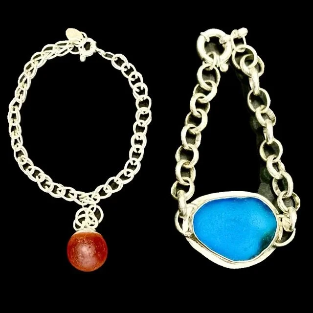 Orange marble from Puerto Rico and aqua -Seaglass from Italy with a hand-linked bracelet chain.
