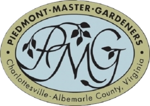 Logo of Piedmont Master Gardeners, featuring the initials 'PMG' in decorative script, with a background of a light blue oval and a yellow circular border that includes the text 'Piedmont Master Gardeners, Charlottesville-Albemarle County, Virginia.'