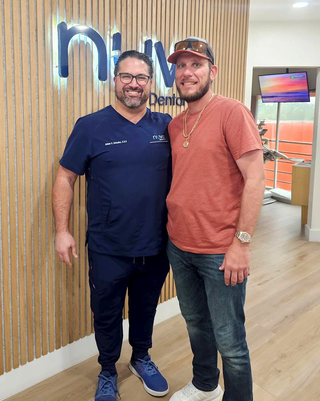 Dr. Adrian smiling with a patient during a comfortable dental visit at Nuvo Dental Arts