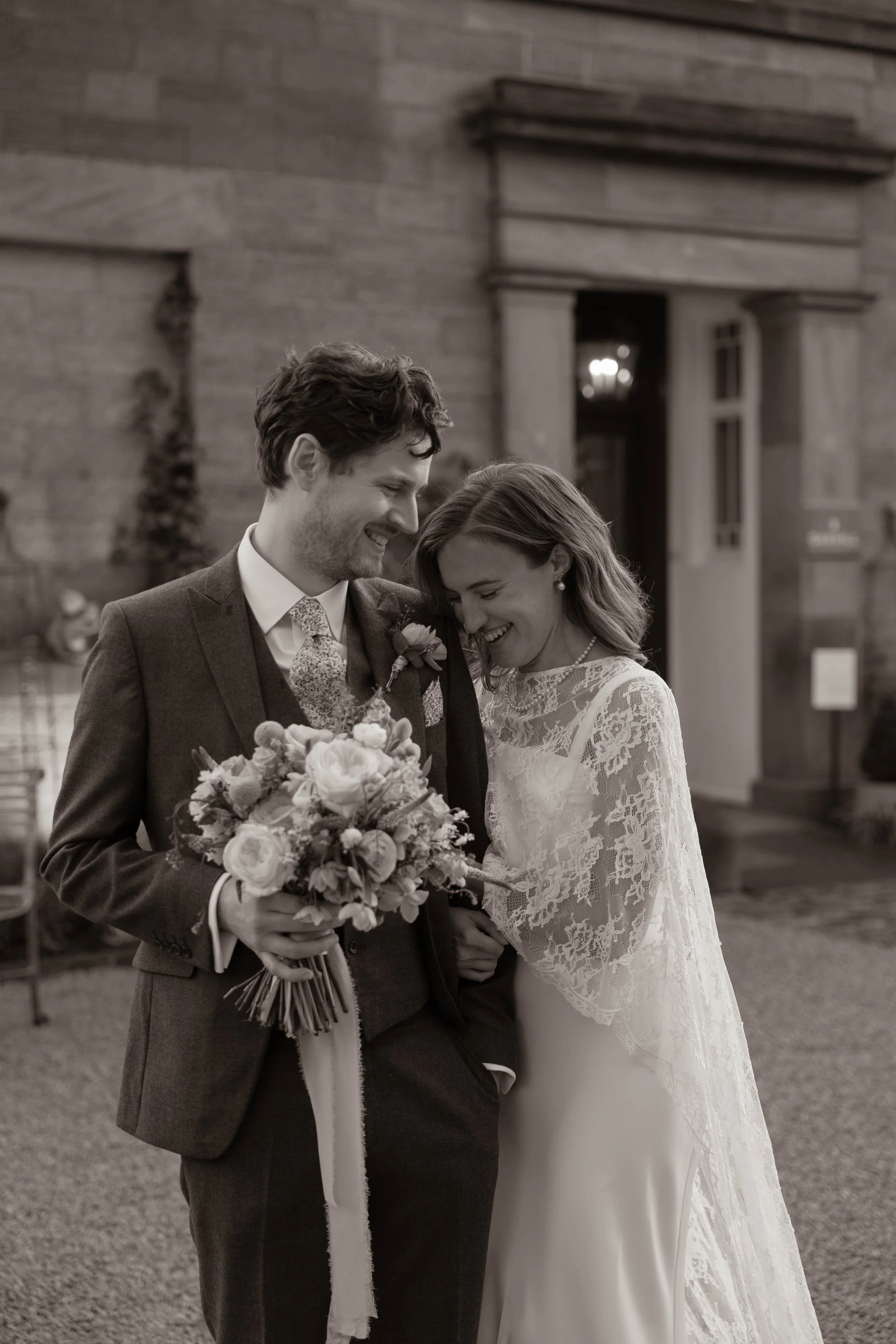 Black and white editorial couple photo. Peak District, Cromford. 