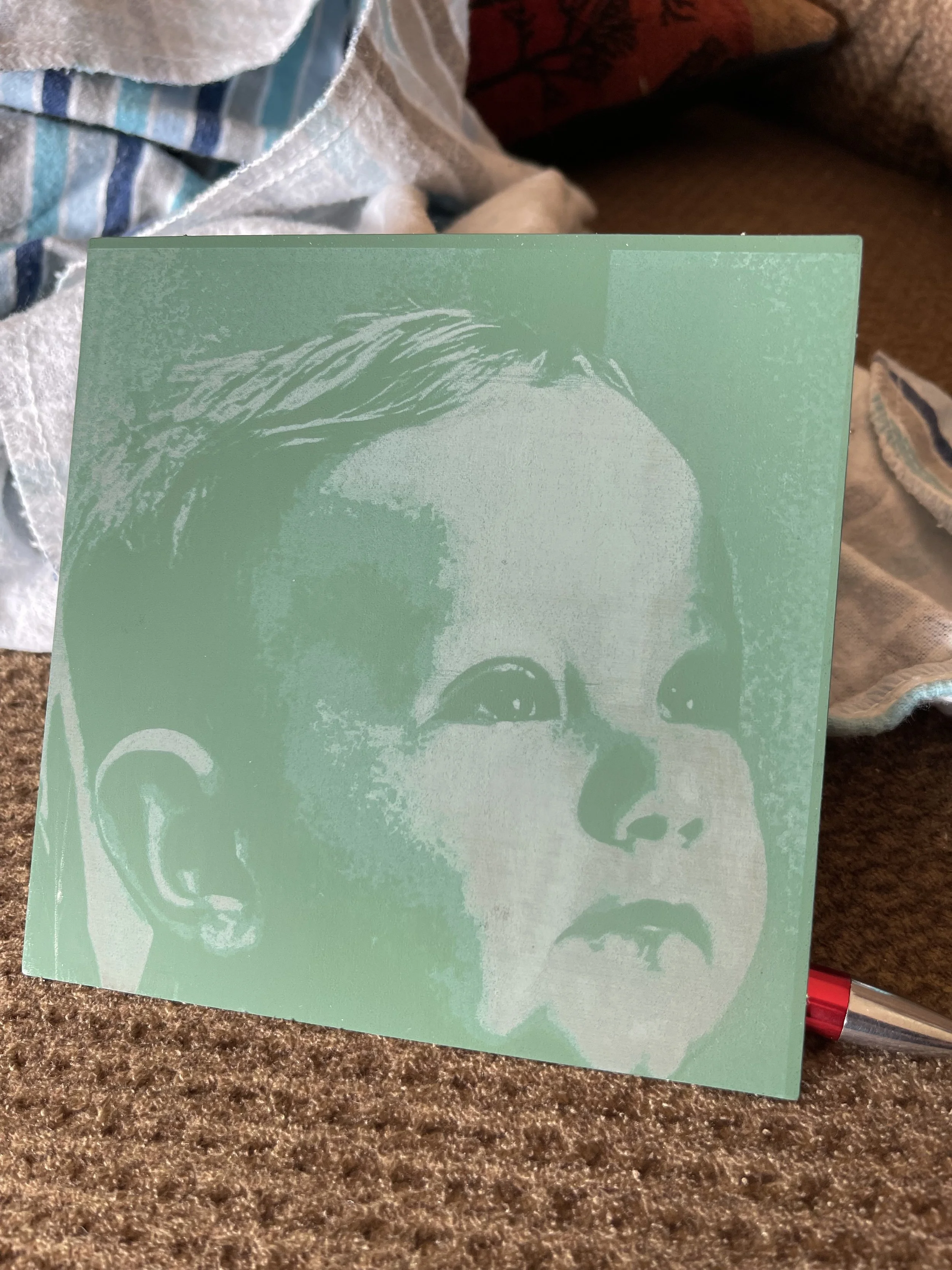 Photo reproduction on child's scratch art paper