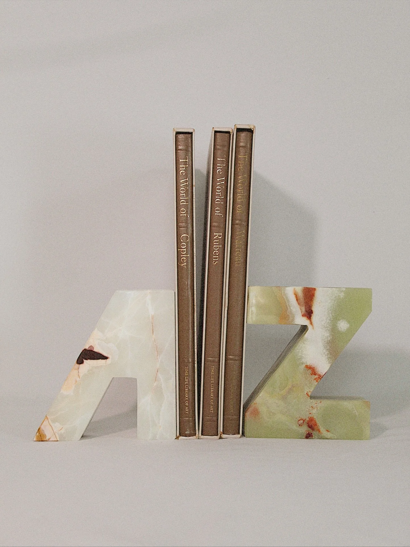 A-Z alphabet letter bookends. These vintage solid onyx pieces would provide such a statement on any bookshelf! 6.25&rdquo; tall. Nearly 11 pounds. Perfect condition. 
$108

Please head to CheckmateHomeInteriors.com to purchase by clicking the link in