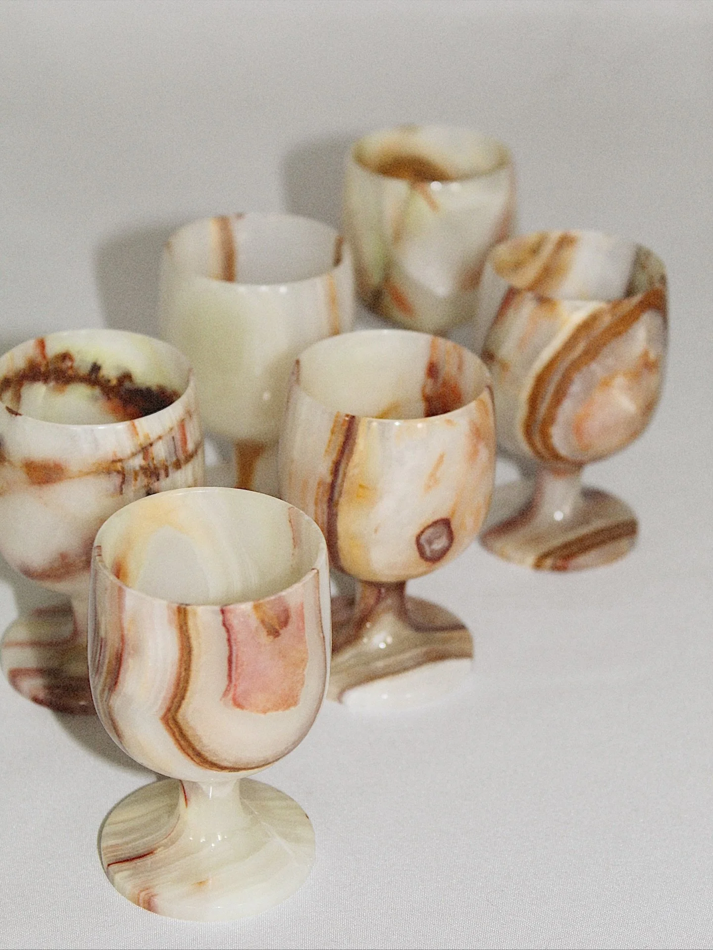 Set of six vintage petite onyx shot glasses complete with a velvet storage case. Imagine how stunning these would look on open shelving in a kitchen or bar area.
Each 3&rdquo; tall. Storage case 8.5&rdquo;. 
$45

Please head to CheckmateHomeInteriors