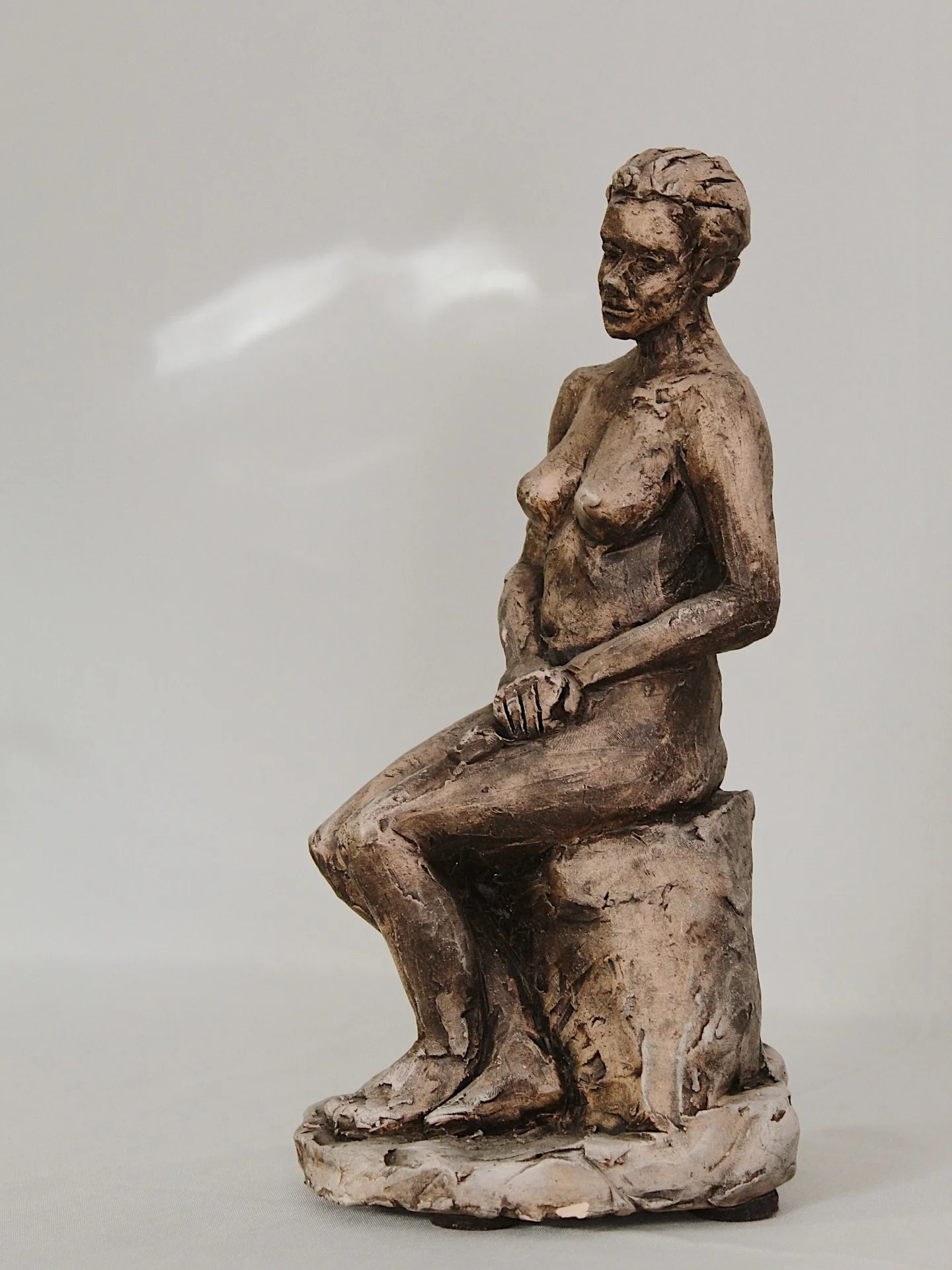 Handmade, signed and dated, this female bust sculpture is truly one of a kind. Signature reads &ldquo;JG 9-05&rdquo; 
Seems to be missing a piece along backside of her head- see photos. 13&rdquo; tall.
$95

Please head to CheckmateHomeInteriors.com t