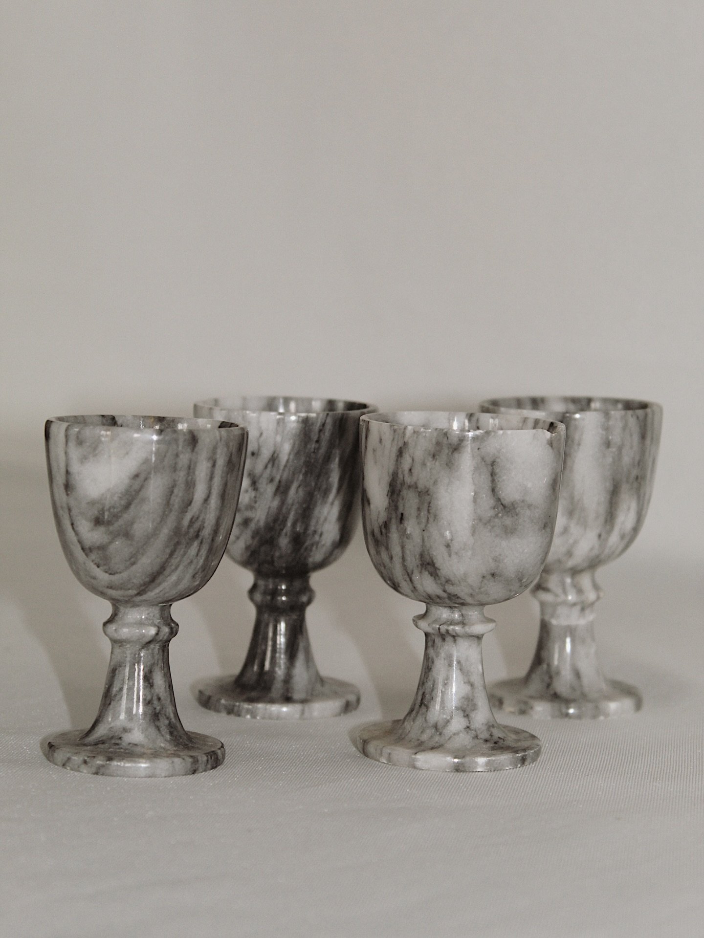 Set of four petite marble goblets, each 3&rdquo; tall. One has been repaired at the stem.
$22

Please head to CheckmateHomeInteriors.com to purchase by clicking the link in our bio. See the &ldquo;How It Works&rdquo; highlight for more information.