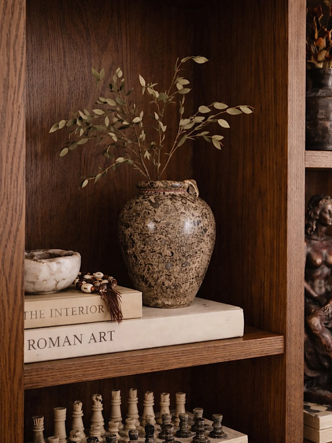 Defined by its natural pattern and sculptural form, this fossil stone vase brings a quiet sense of character to any space. 

Grounded, timeless, and intentionally chosen- one of the few pieces remaining from this collection, each with its own subtle 