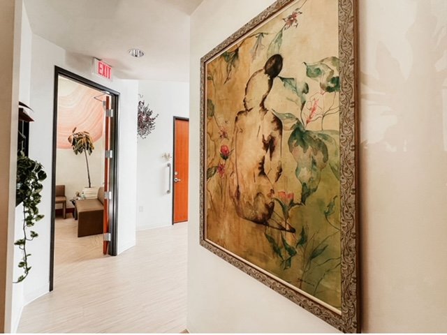 Branding, art curation (women artists), sourcing, planning, and interior design services for a new women's medical clinic in Portland, OR, featuring Golden Our artist, Laju Sholola