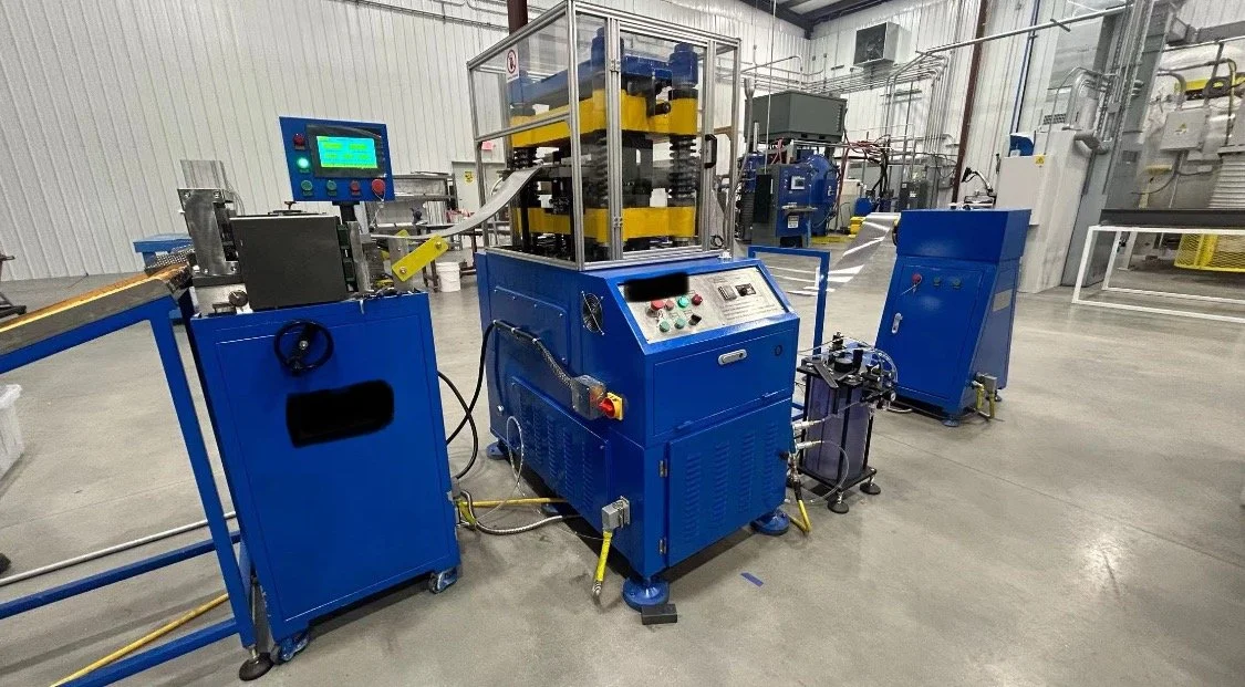 Oranssi technician working on a roof project