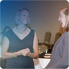 Jennifer Thompson networking with a lady at an event