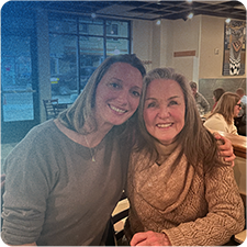 Two ladies hugging and connecting