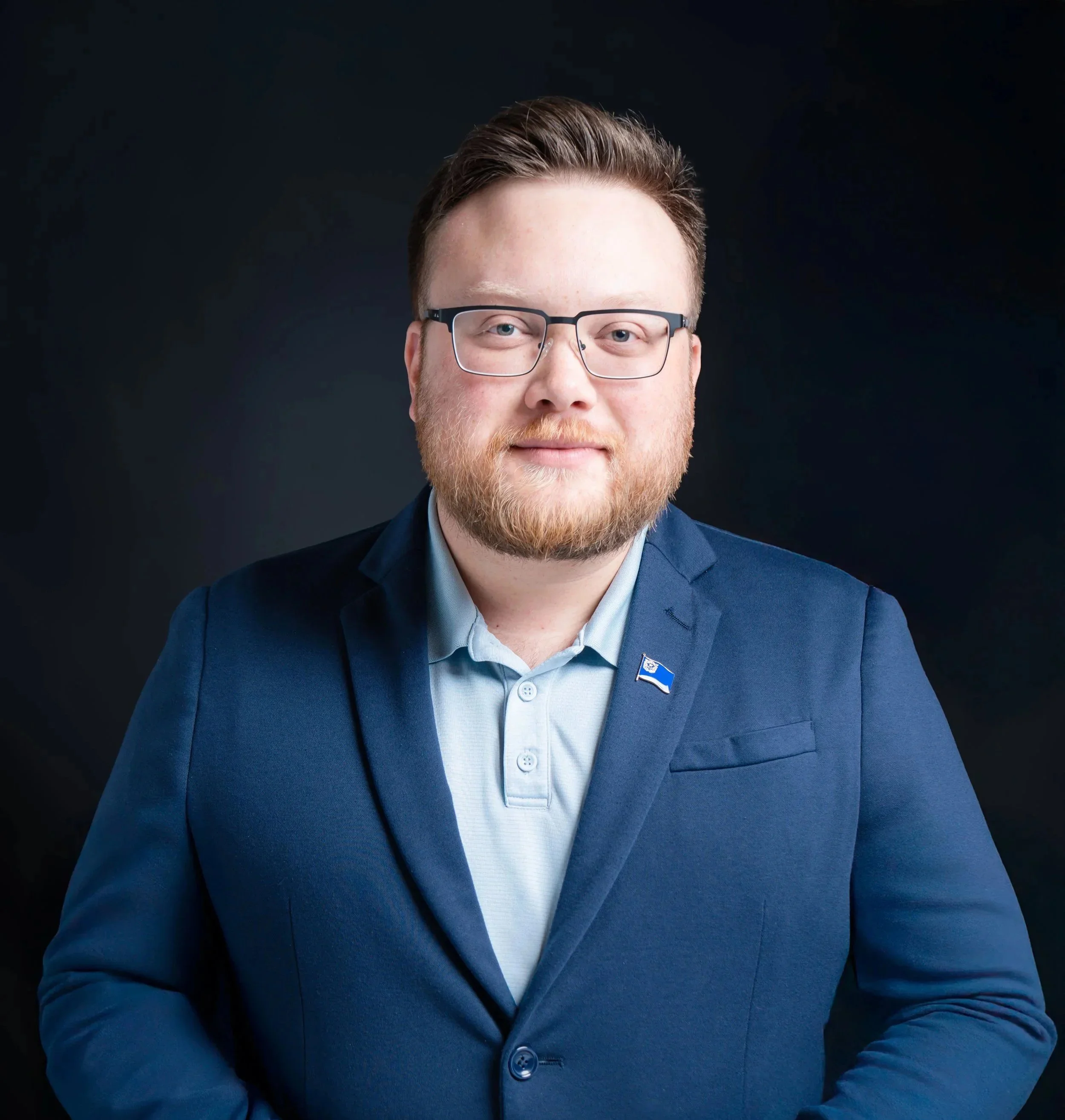 A formal portrait of Hunter Rand, candidate for Sparks City Council, Ward 2.