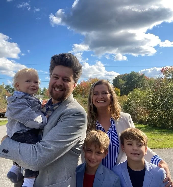 Dr. John Daggett posing with family