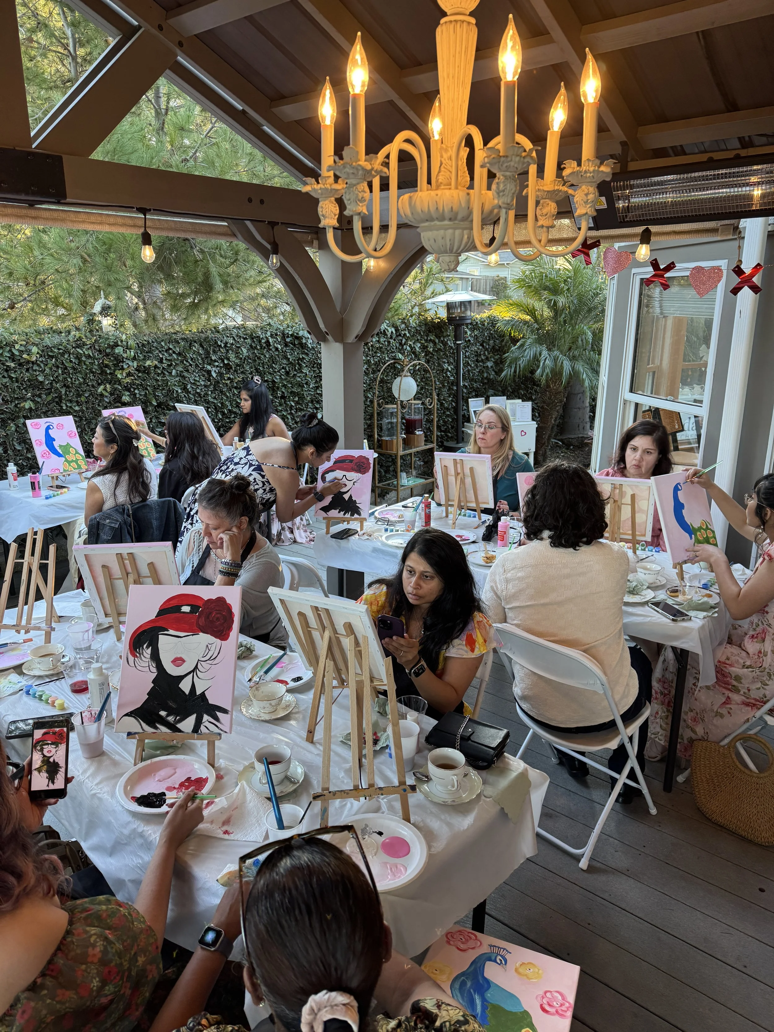 A painting party with peacock and vogue women paintings