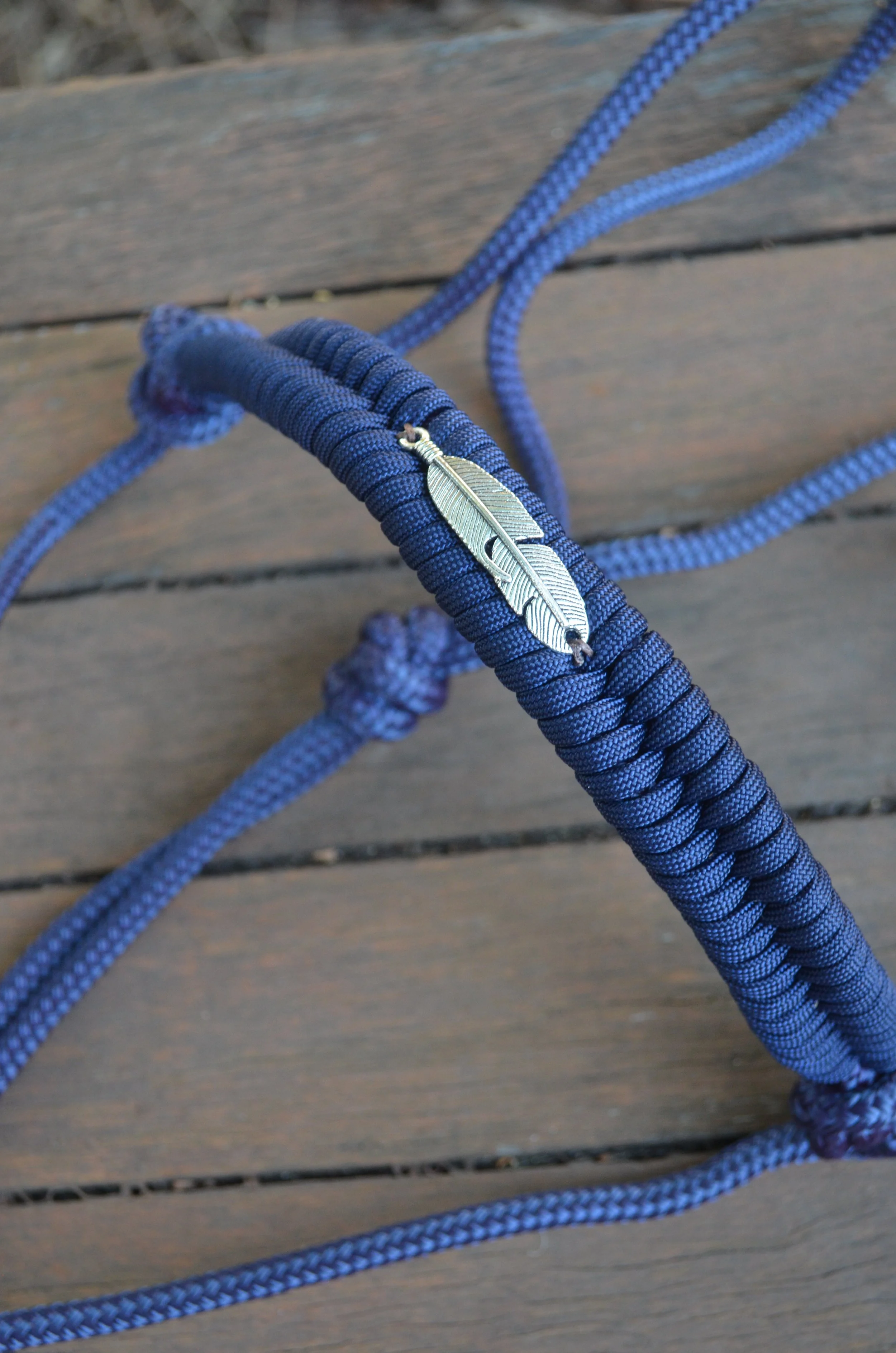 Navy rope halter with embroidered noseband (feather charm)