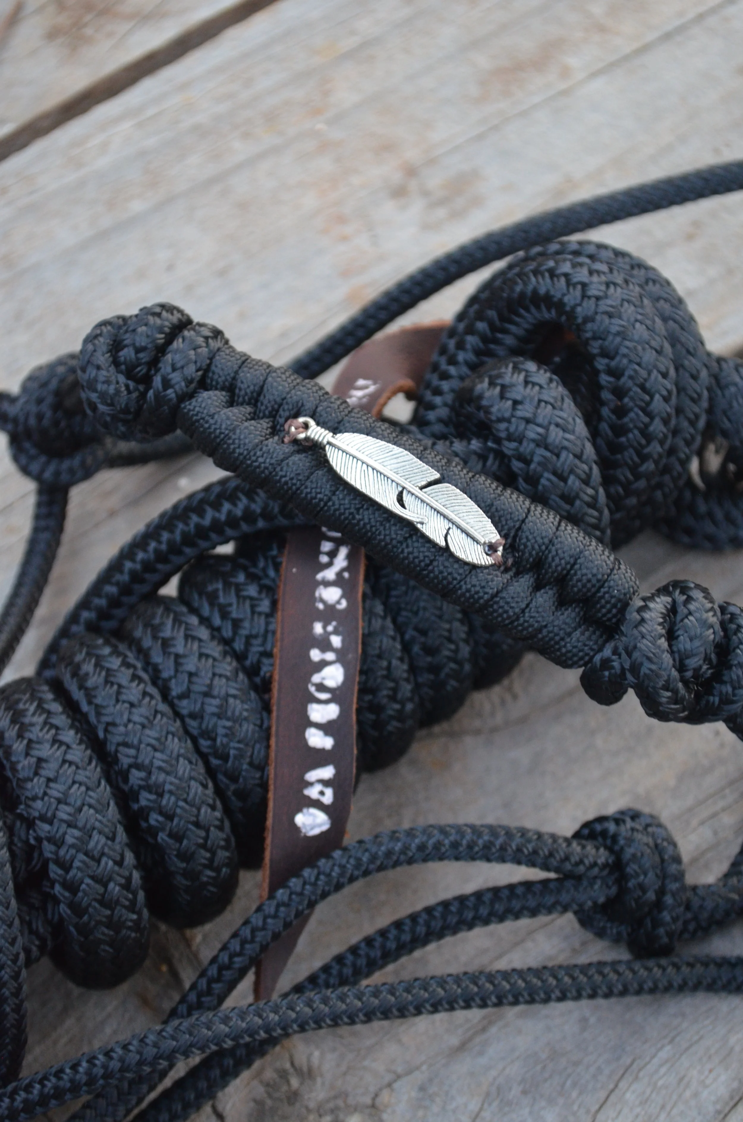 Black 4 knot rope halter with embroidered noseband (feather charm)