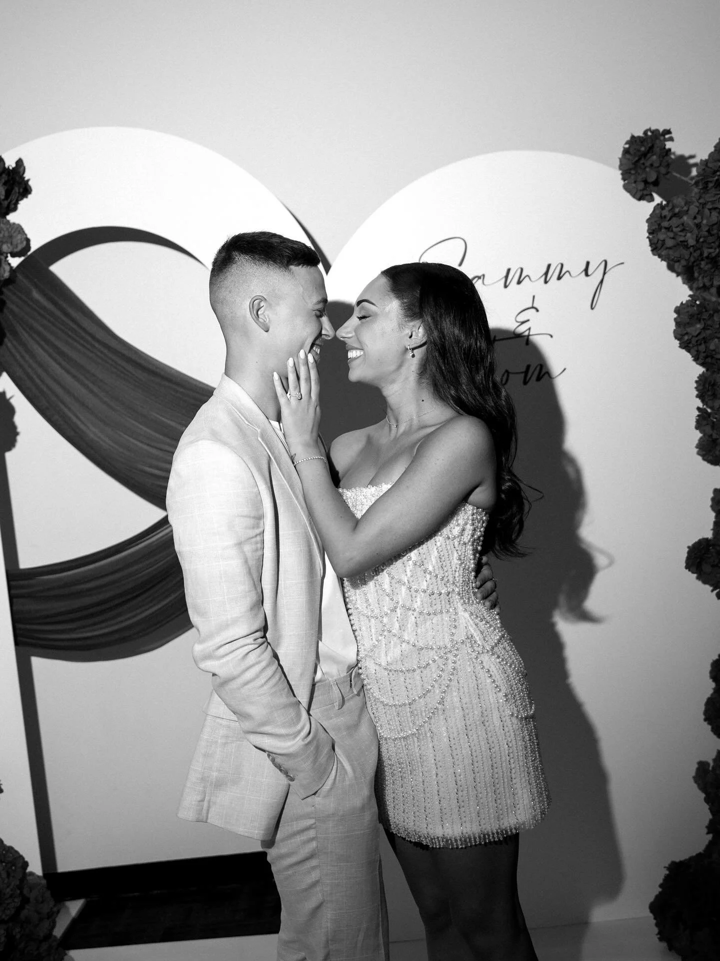 Love the black &amp; white moments from Sammy &amp; Tom&rsquo;s engagement 🤍 @sammyantoniou 

Backdrop: @partyglam_co 
Venue: @settlersrungcc