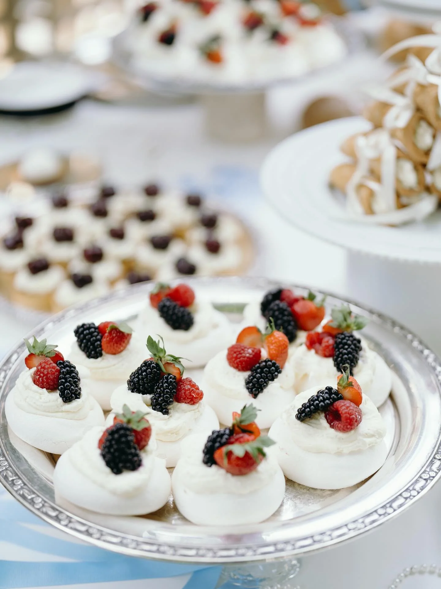 Berry-topped meringues because it&rsquo;s the season of garden parties.