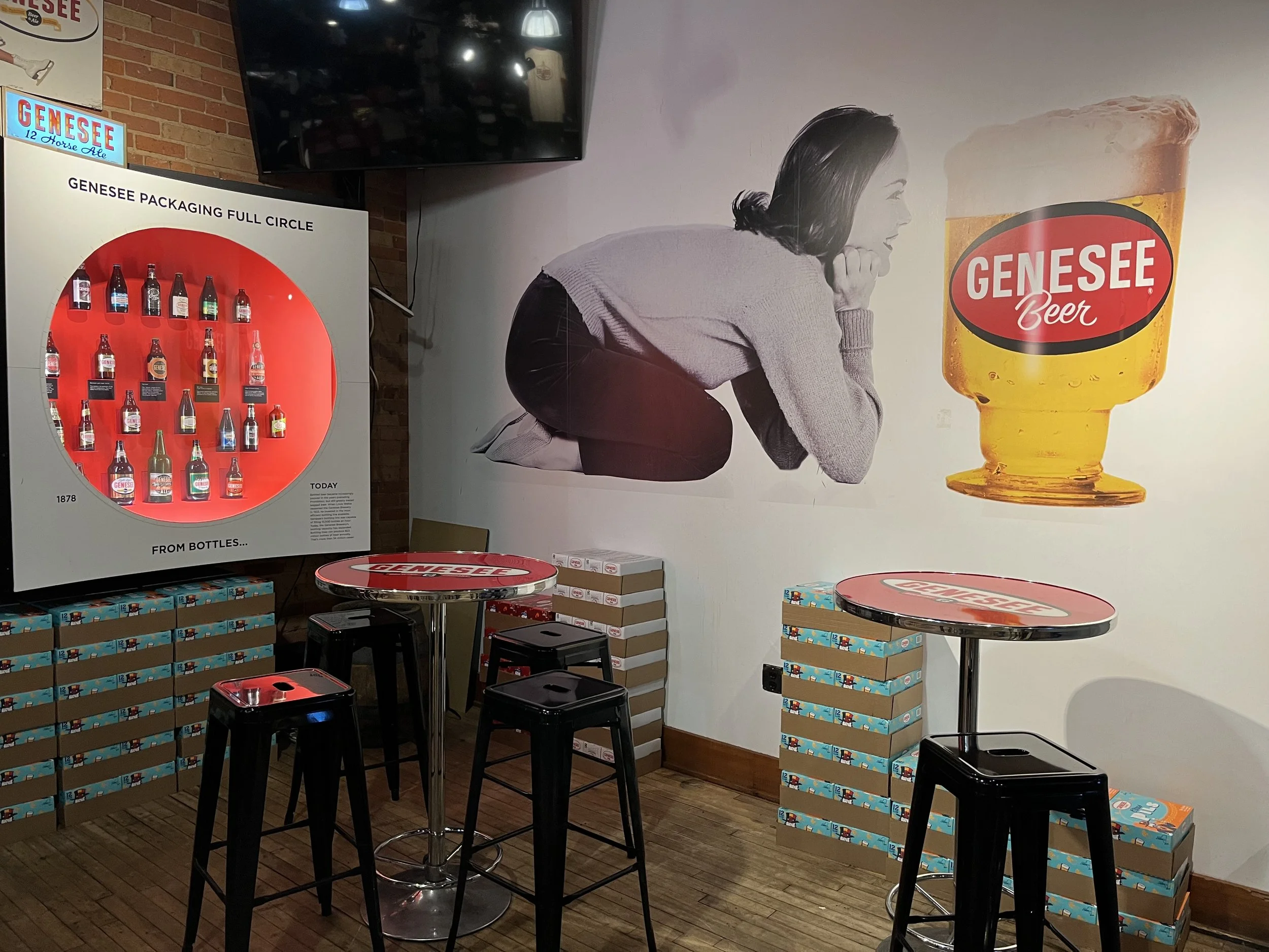Genesee Brew House lower-level seating with packaging history display Rochester, NY