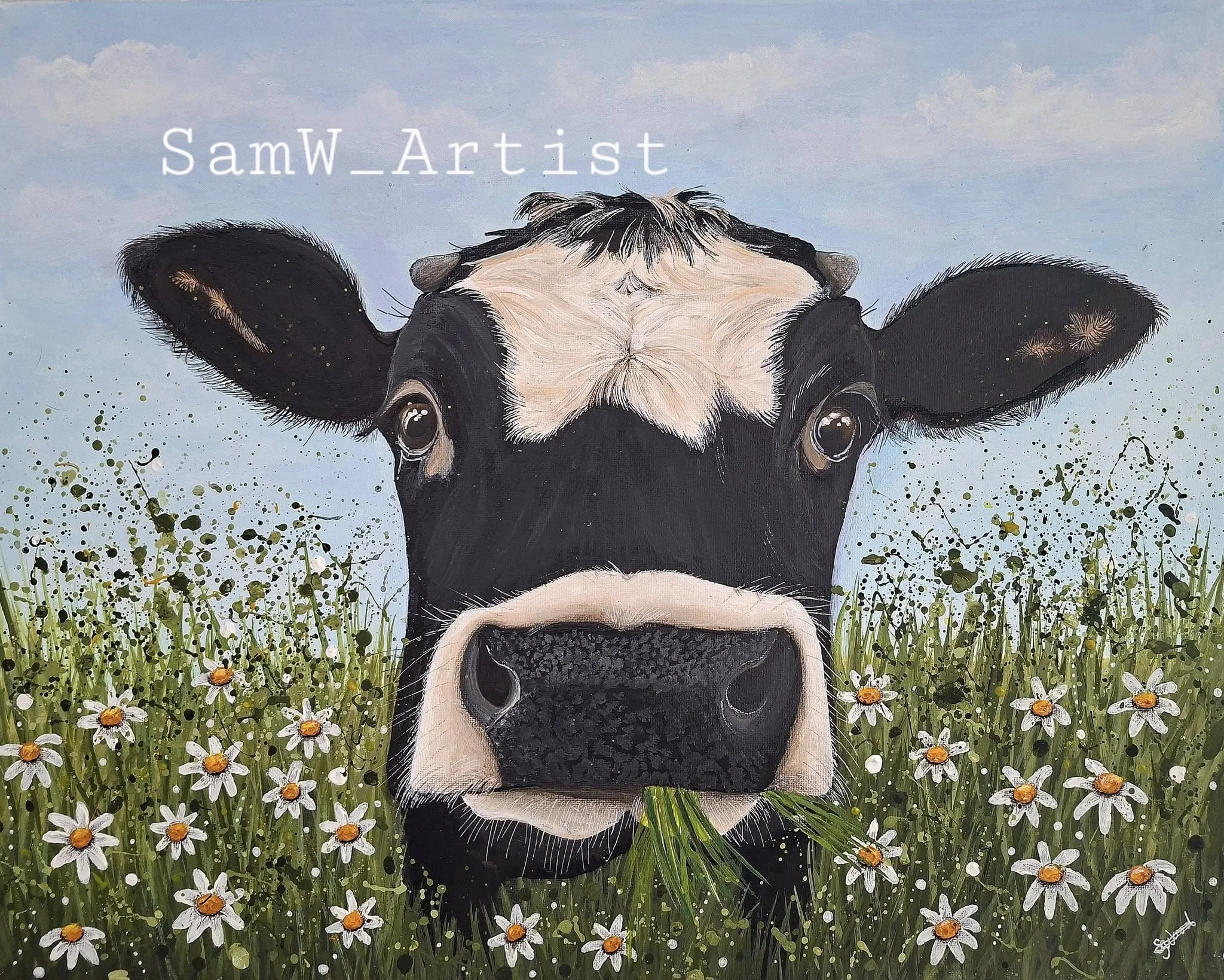 Cow eating grass.jpg