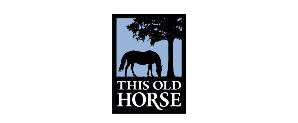 Silhouette of a horse grazing under a tree with the text "This Old Horse" below.