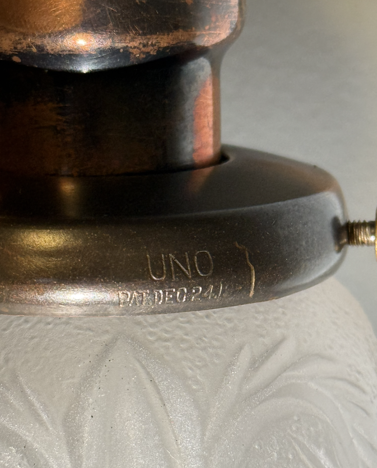 Typical of affluent St. John's homes in the early 1900s, these rigid-stem drops feature General Electric brass sockets