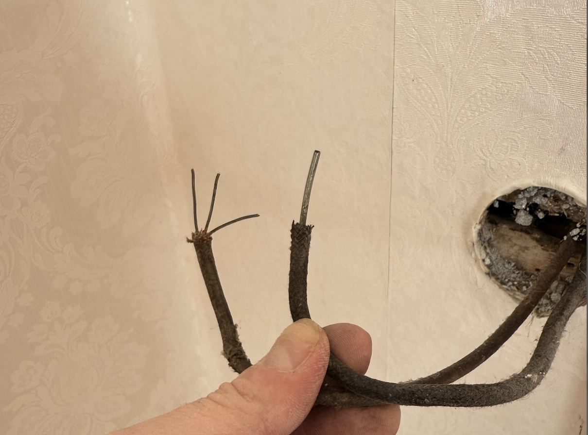 Knob & Tube Wiring (Stranded vs. Solid Copper): Exposed during a renovation in a century-old St. John's lath and plaster wall