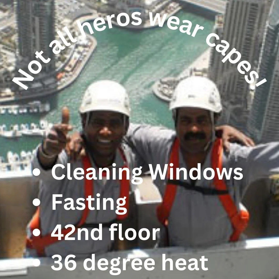 Not all heros wear capes! - Cleaning windows in 36 degree heat on the 42nd floor during #ramadan
