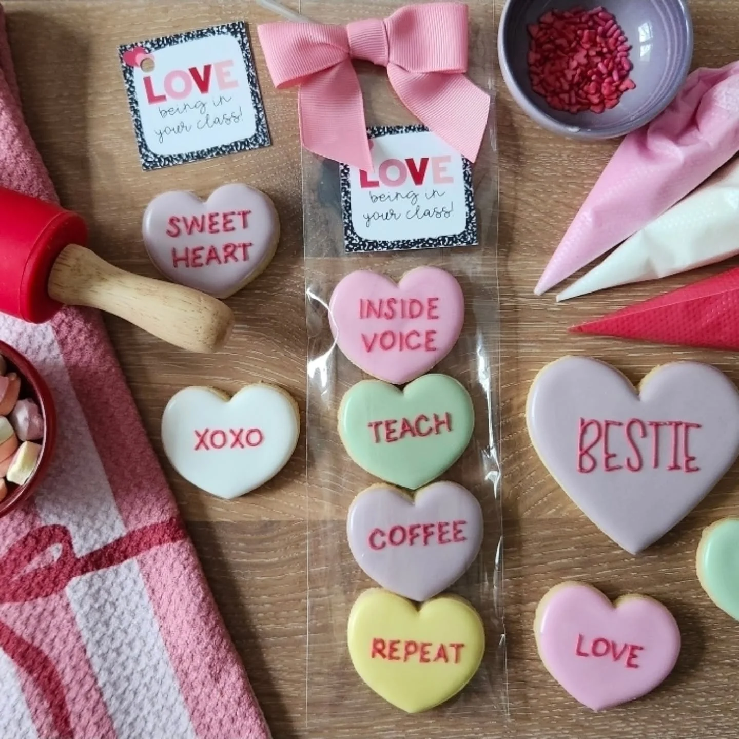 We appreciate our teachers more than they probably know. 💖

Show them some Valentine&rsquo;s love with a mini pack of Teacher Conversation Heart Cookies. 🍪💌

Because shaping little hearts deserves a sweet thank-you! 💘

#valentinescookies #teacher
