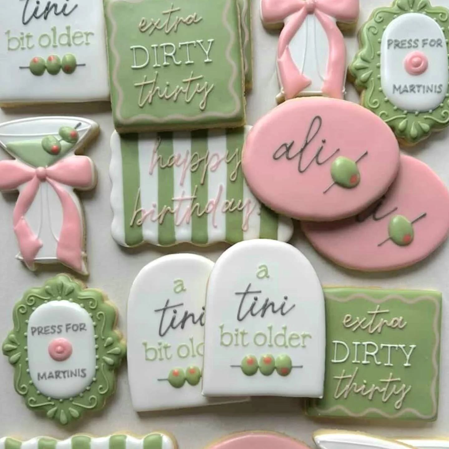 A sweet way to toast another year! 🍸

How many olives is too many olives? Asking for a friend... 👀

#atinibitoldercookies #martinicookies #birthdaycookies #customsugarcookies #clevelandcookies