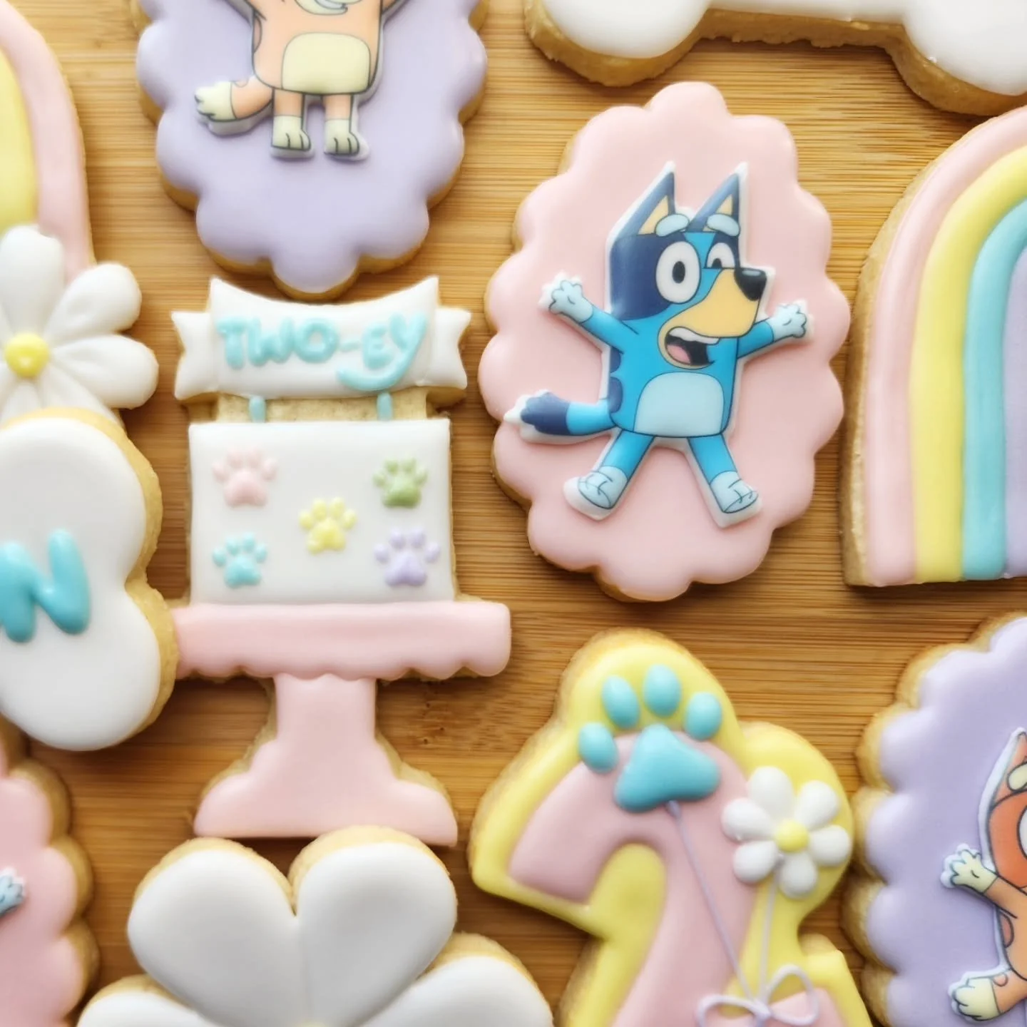 Anybody else's kids obsessed with Bluey? Mine were SO excited when they saw these cookies. 

#bluey #blueycookies #birthdaycookies #customsugarcookies #twoey